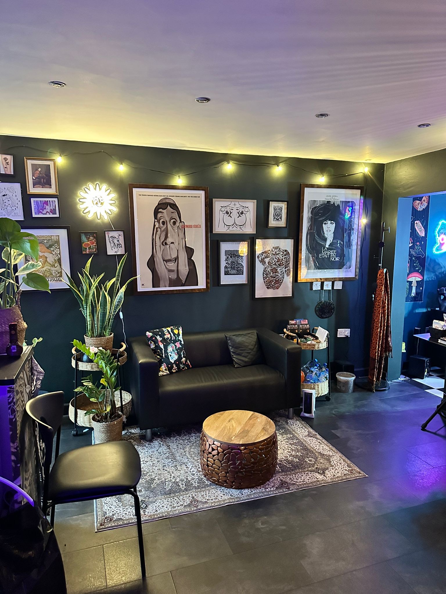 Picture of the client waiting area at Ashton Ink Tattoo Studio, a , a gay friendly tattoo shop