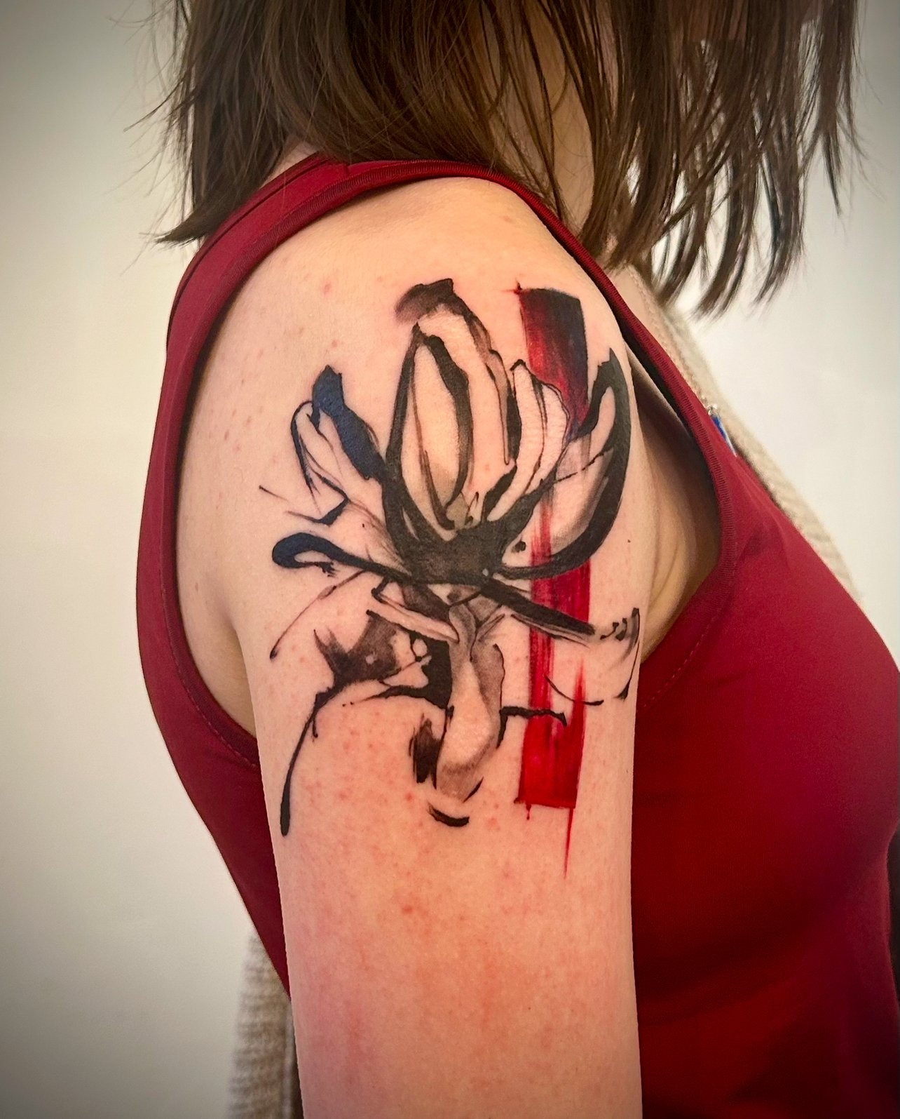 Sumi-e inspired hand drawn flower tattoo done by Sway Tattoo at Ashton Ink Tattoo Studio - tattoo studio manchester